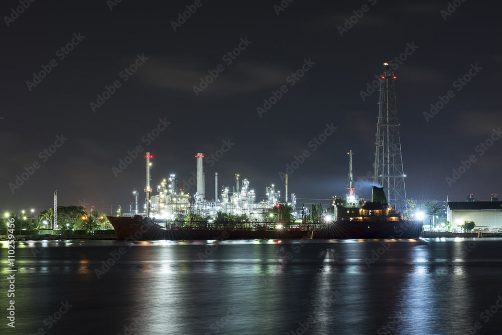 Beautiful light of oil refinery factory in night time.