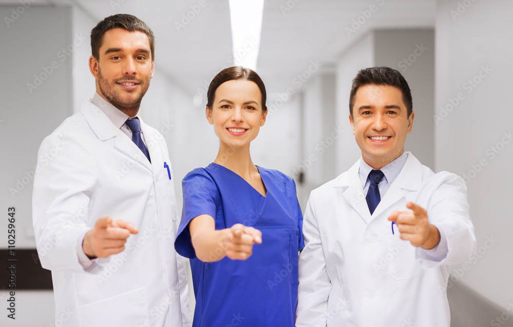 group of medics pointing finger on you at hospital group of medics pointing finger on you at hospital
