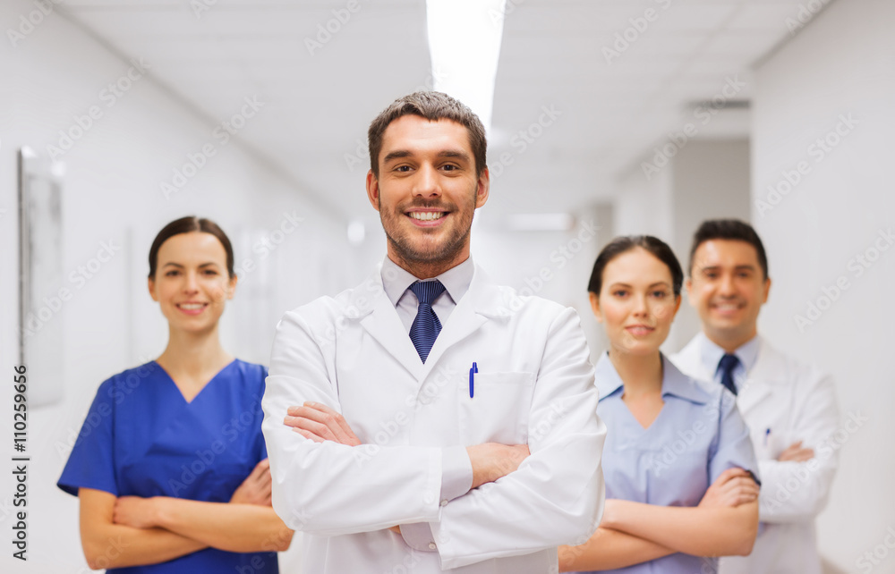 happy group of medics or doctors at hospital happy group of medics or doctors at hospital