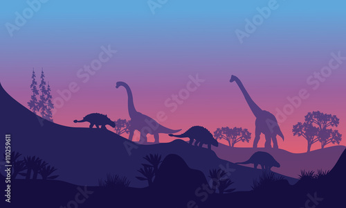 Silhouette of Brachiosaurus and Ankylosaurus  © wongsalam77