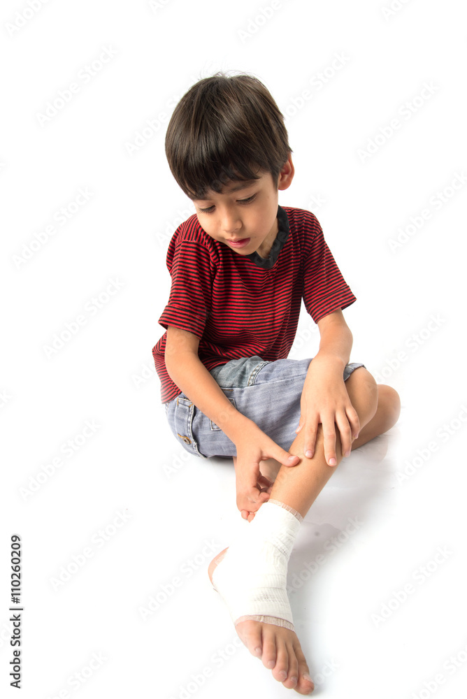 Little boy has an accident with his leg need bandage for first aid Little boy has an accident with his leg need bandage for first aid