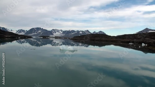 Wallpaper Mural Sea mountains and large icebergs reflecting in the water.  Fantastic wonderful amazing video grenland nature iceland. Lovely shooting the life of nature, seaside and mountains. Torontodigital.ca
