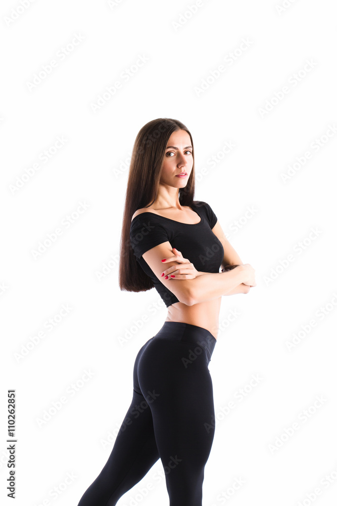 Fototapeta premium Beautiful Fitness woman in black sports clothes isolated.