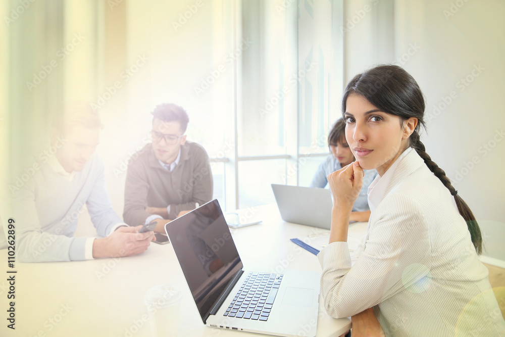 Start-up businesspeople sharing working space Start-up businesspeople sharing working space