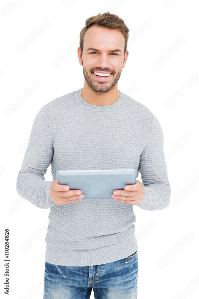 Happy young man using digital tablet Happy young man using digital tablet