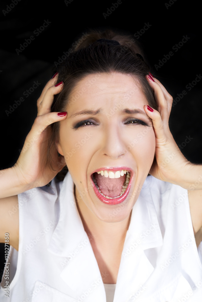 Young panic woman with hands on the head Young panic woman with hands on the head