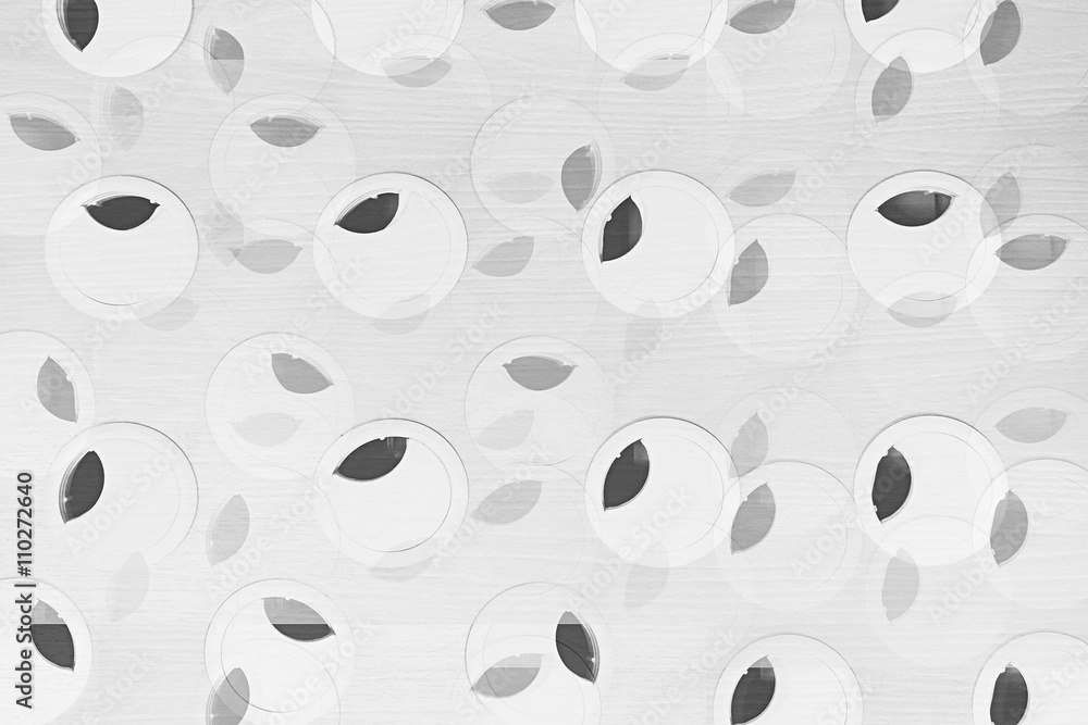 Minimalist abstract black-and-white background with circles and black leaves. Abstract background.