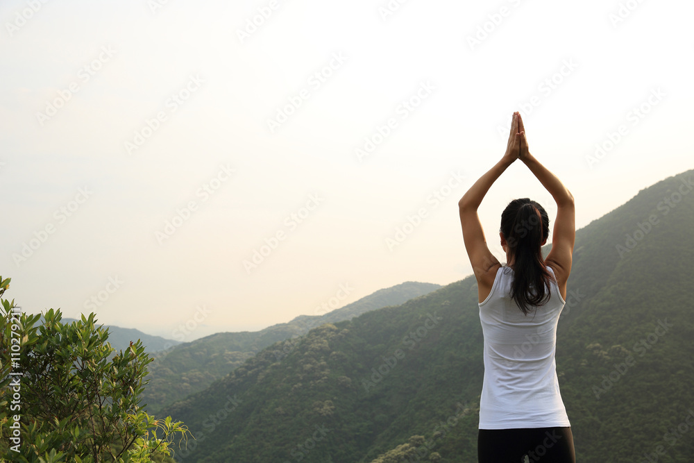 young fitness yoga woman at mountain peak young fitness yoga woman at mountain peak