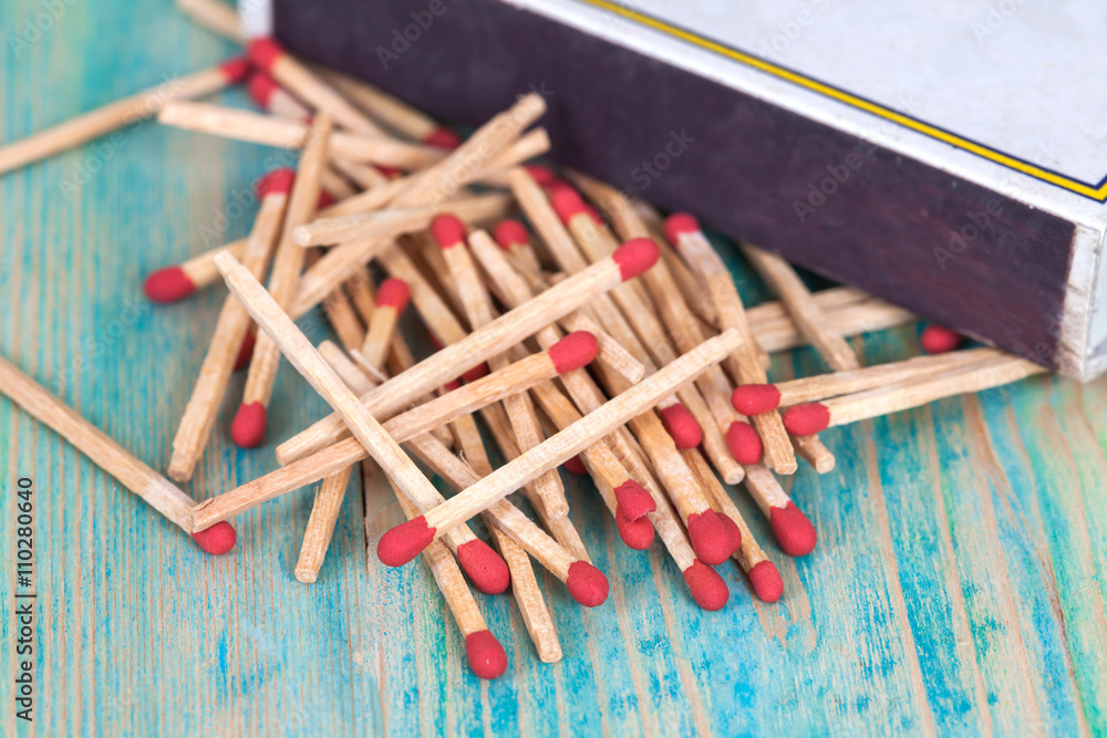 Matchsticks over wooden background Matchsticks over wooden background