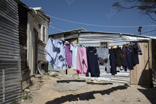 IMIZAMO YETHU TOWNSHIP WESTERN CAPE SOUTH AFRICA - APRIL 2016 - Washing hanging out to dry in this crowded township at Hout Bay Southern Africa © petert2