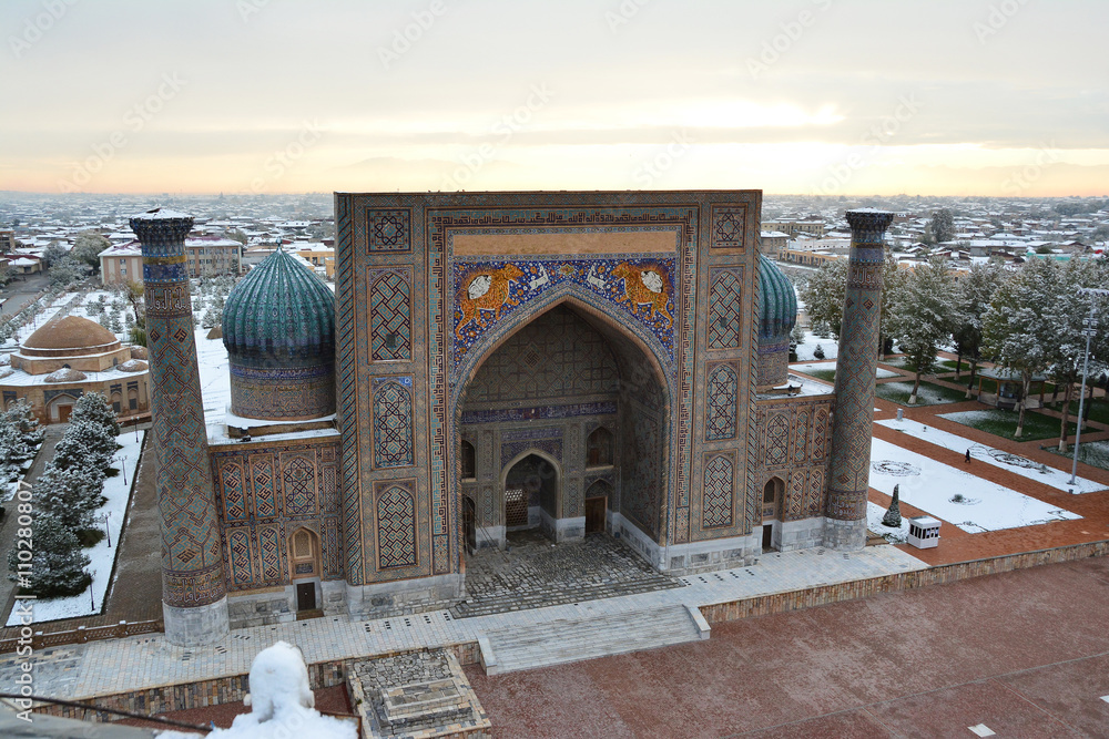 Sher-dor madrasah of Registan under the snow, Samarkand, Uzbekistan