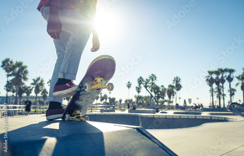 Skater boy ready to performing tricks at the skate park