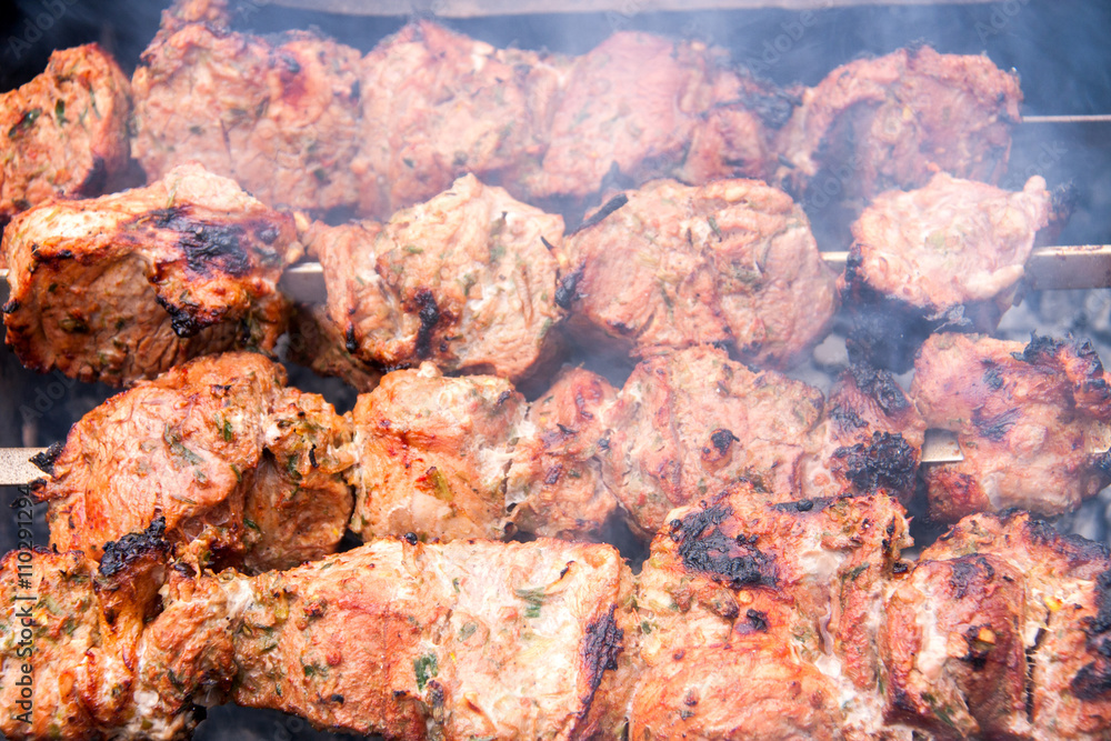 barbecue a shish kebab pork on skewers over charcoal barbecue a shish kebab pork on skewers over charcoal