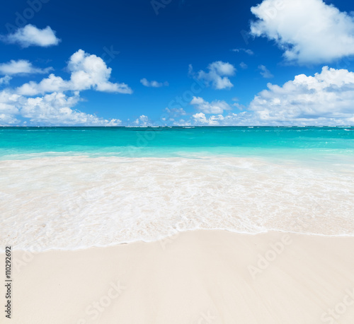 Wave of the sea on the sand beach