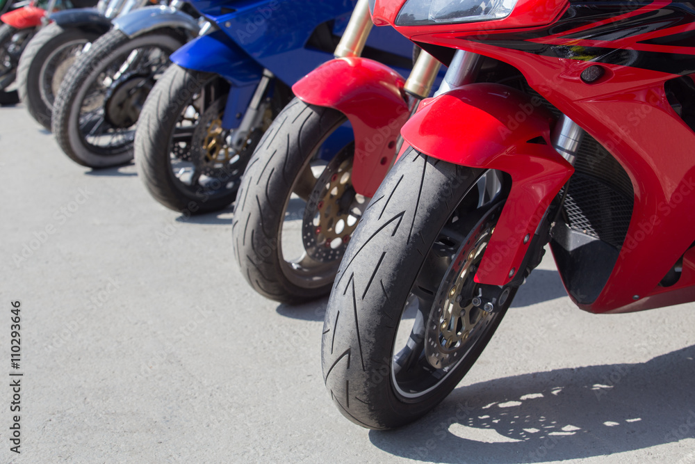 motorcycles on parking on asphalt