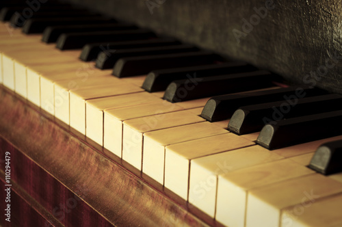 Closeup of old piano keyboard