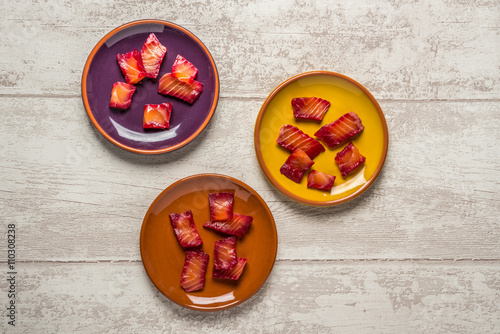 Beetroot Gravalax on three plates photo