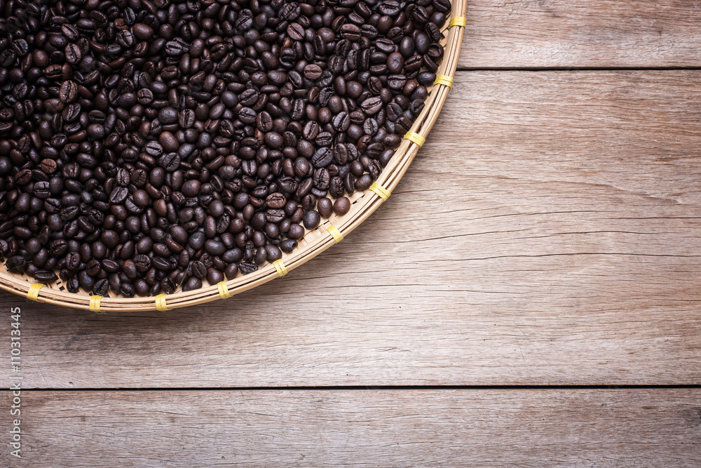 Coffee beans on wooden background, Composition with free space o Coffee beans on wooden background, Composition with free space o