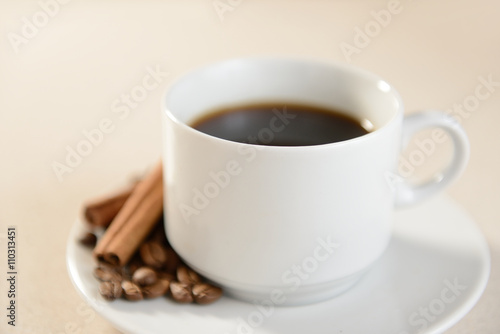 Cup of coffee with cinnamon