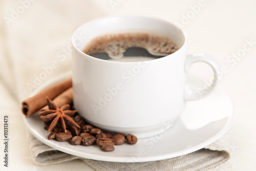 Cup of coffee with cinnamon