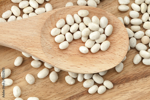 soya bean in wooden ladle