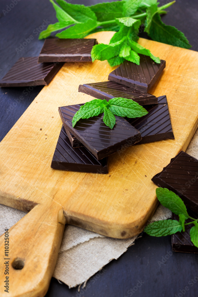 Stack of chocolate bars with mint Stack of chocolate bars with mint