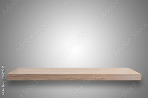 Empty top of wooden shelf isolated on white background