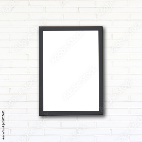 Blank of wooden photo frame on stone wall