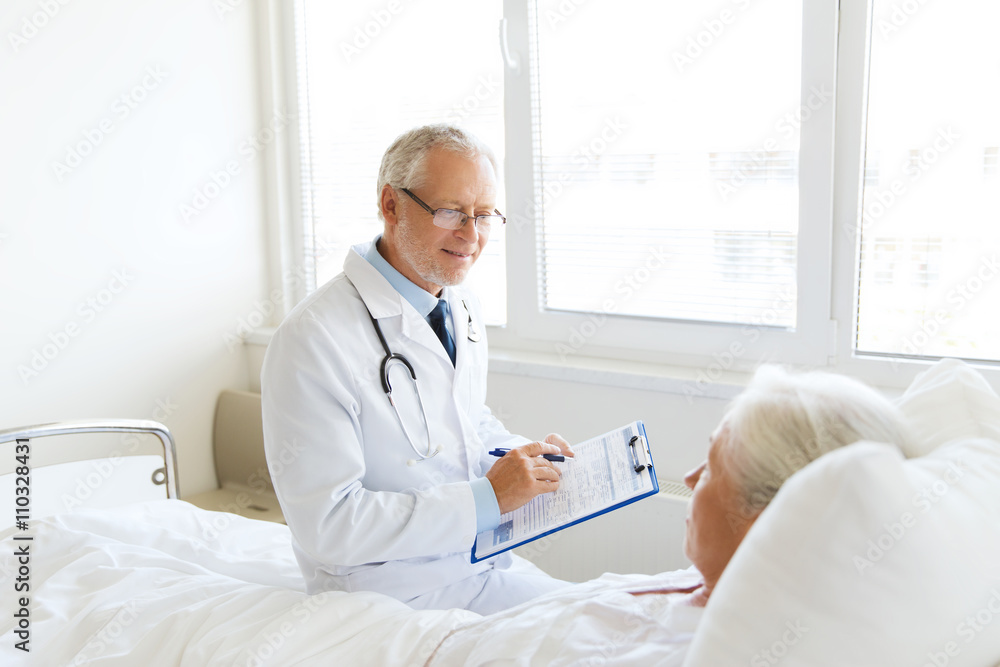 senior woman and doctor with clipboard at hospital senior woman and doctor with clipboard at hospital