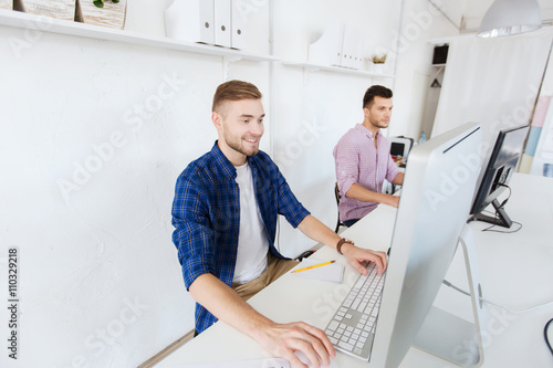 creative man or student with computer at office