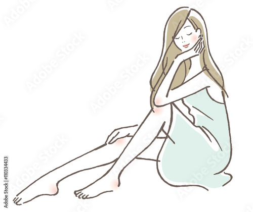 目をとじる女性