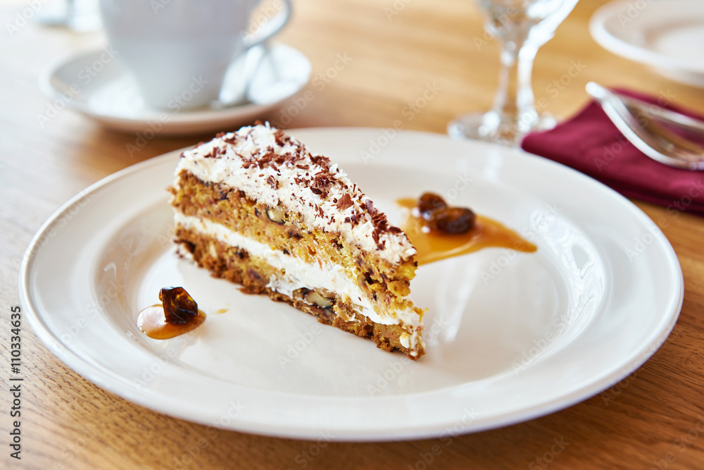 Piece of nut cake on plate Piece of nut cake on plate