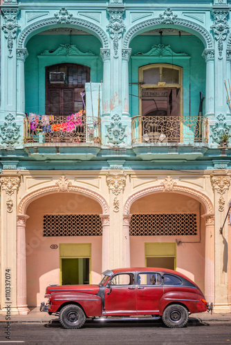 Classic vintage car and coloful colonial buildings in Old Havana, Cuba. Travel and tourism in Cuba