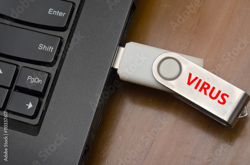 Virus USB thumb drive plug in to laptop computer port