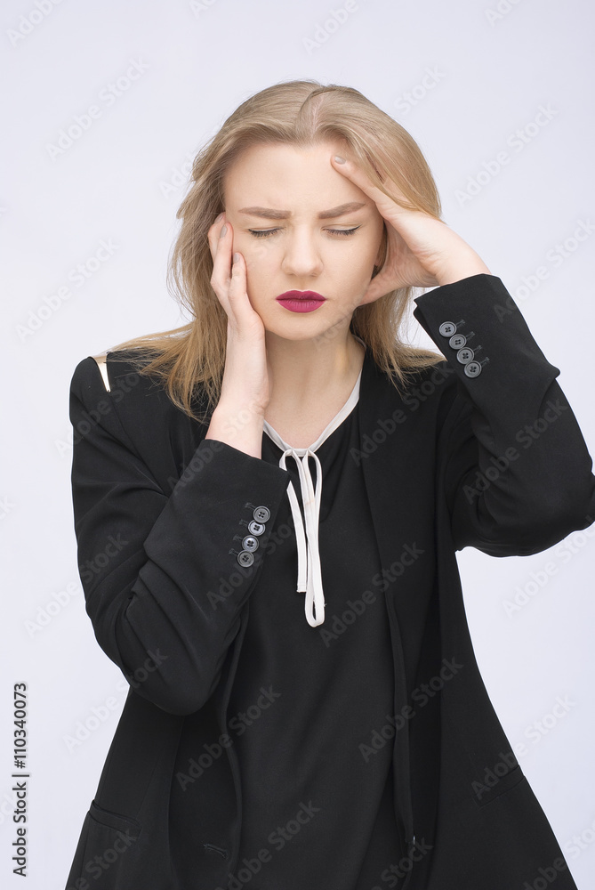 businesswoman suffering a headache businesswoman suffering a headache