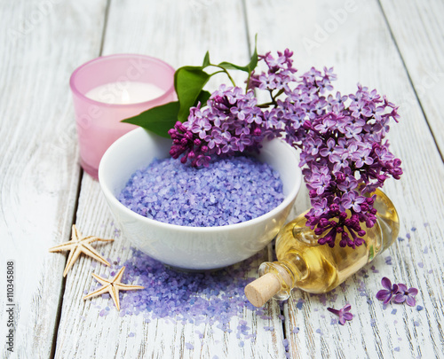 Spa setting with lilac flowers