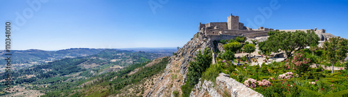 The Marvao Castle located on top of a cliff with a view over the Alto Alentejo landscape. Marvao, Portalegre District, Alto Alentejo Region, Portugal. Candidate to World Heritage Site by UNESCO. photo