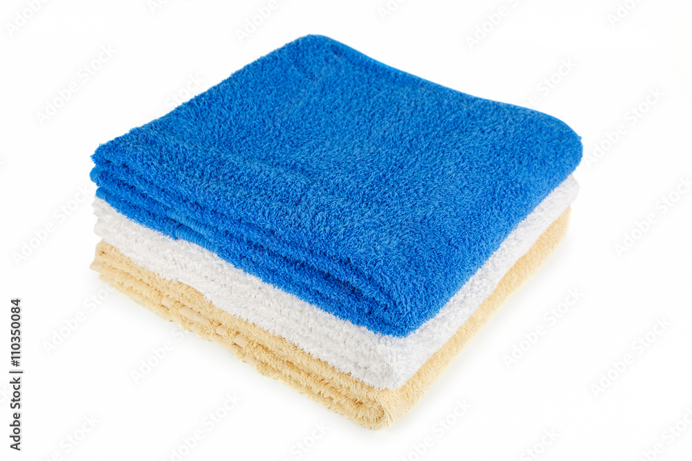 Stack of towels on a white background. Stack of towels on a white background.