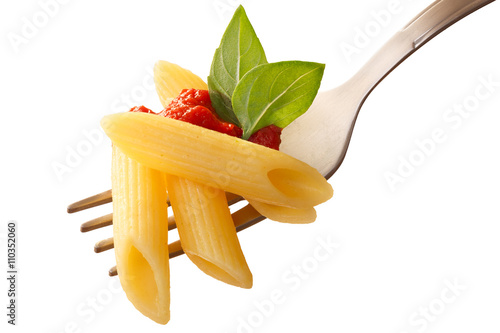 Penne rigate pasta with tomato sauce and basil on a fork photo