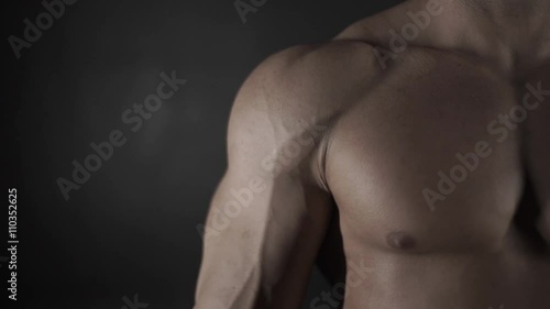 Muscular man on a black background