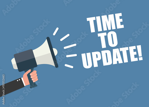Hand holding megaphone - Time to update