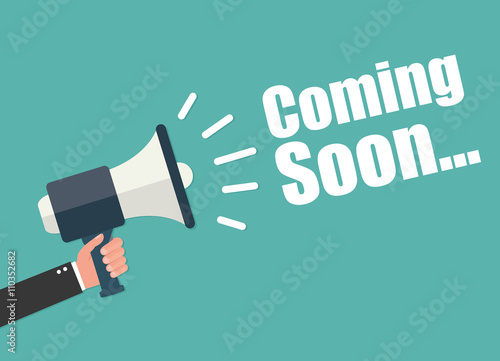 Hand holding megaphone - Coming Soon