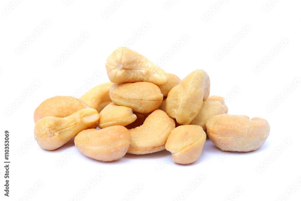 Roasted salted cashews isolated on a white background Roasted salted cashews isolated on a white background
