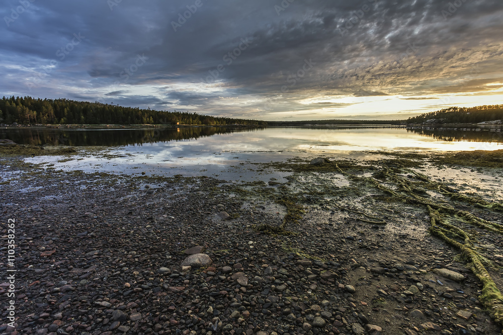 Fototapeta premium Sunset over White Sea in Russia