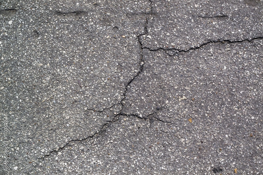 Obraz premium Asphalt texture with cracks