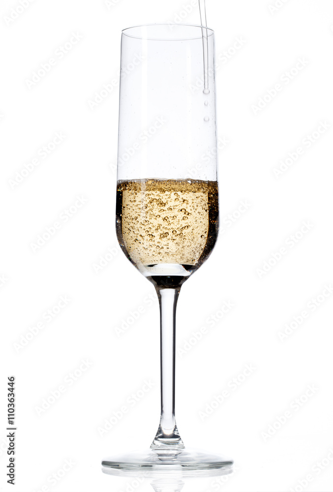 filling champagne flute with champagne.