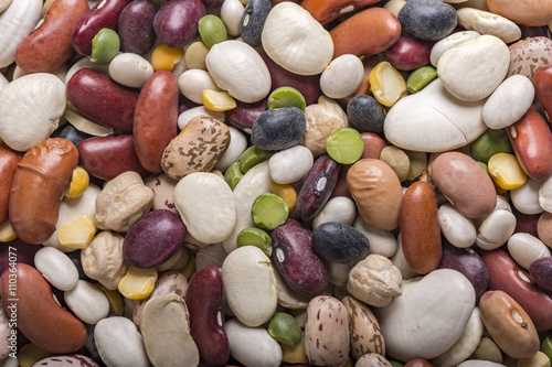 Variety of dried beans legumes background