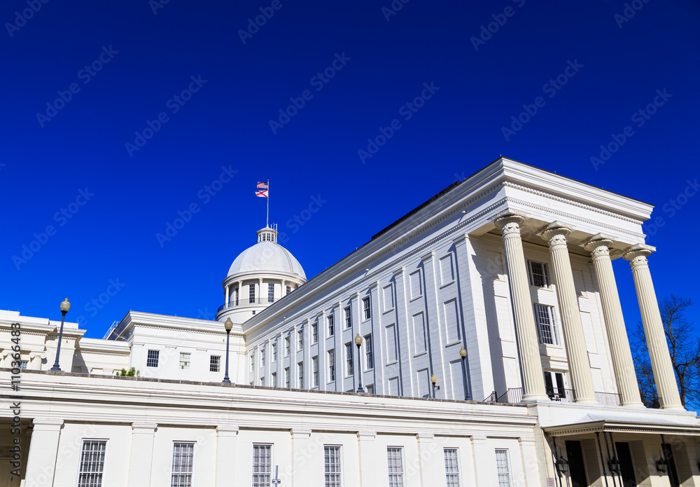 Fototapeta premium Alabama State Capitol Rear Angle: Rear angle perspective of the Alabama State Capitol with its grand columnal owning.