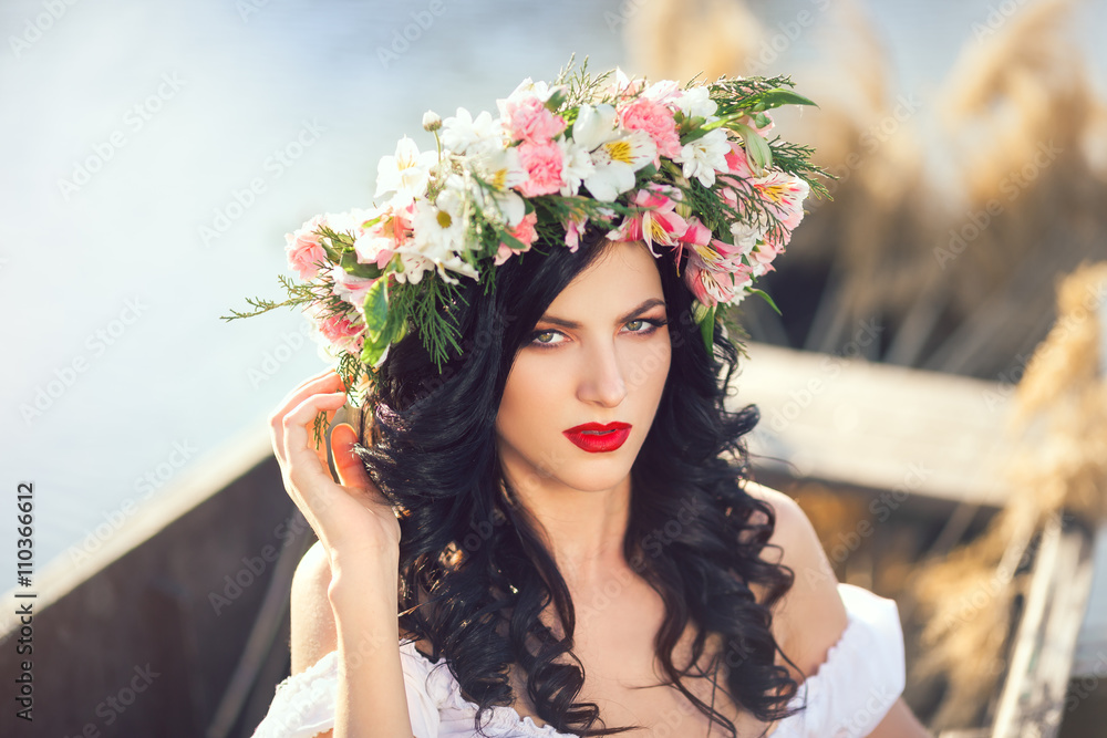 Fashion art photo of a beautiful lady sitting in the boat Fashion art photo of a beautiful lady sitting in the boat
