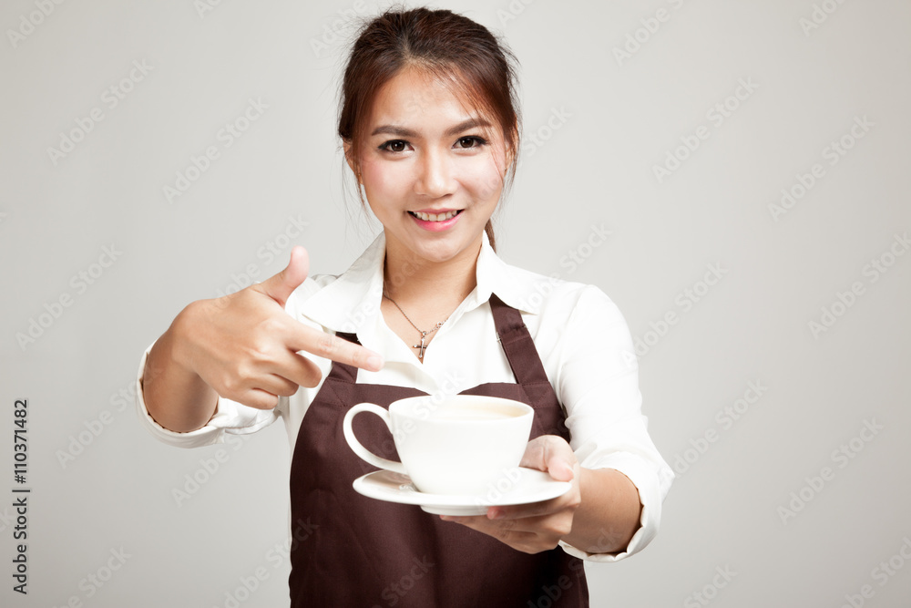 Waitress or barista in apron holding coffee Waitress or barista in apron holding coffee